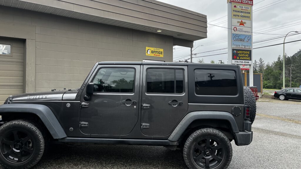 "4x4 jeep before a 4-inch lift - West Kelowna automotive shop"